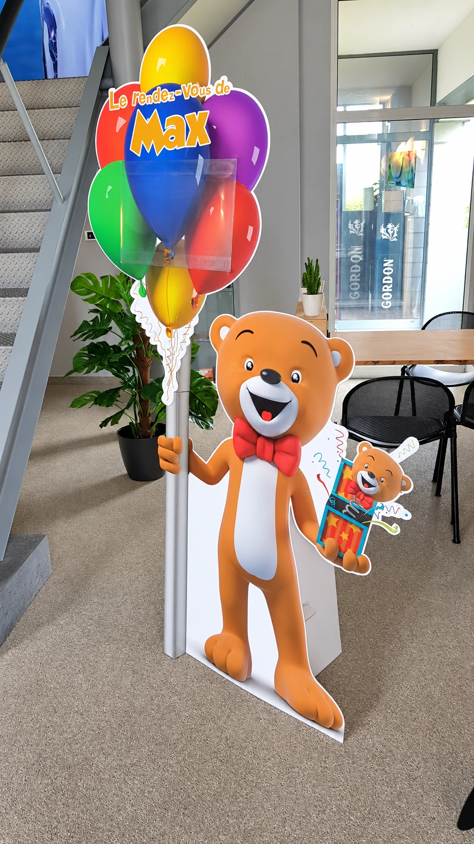 Freestanding Maxi Toys bear mascot cut-out