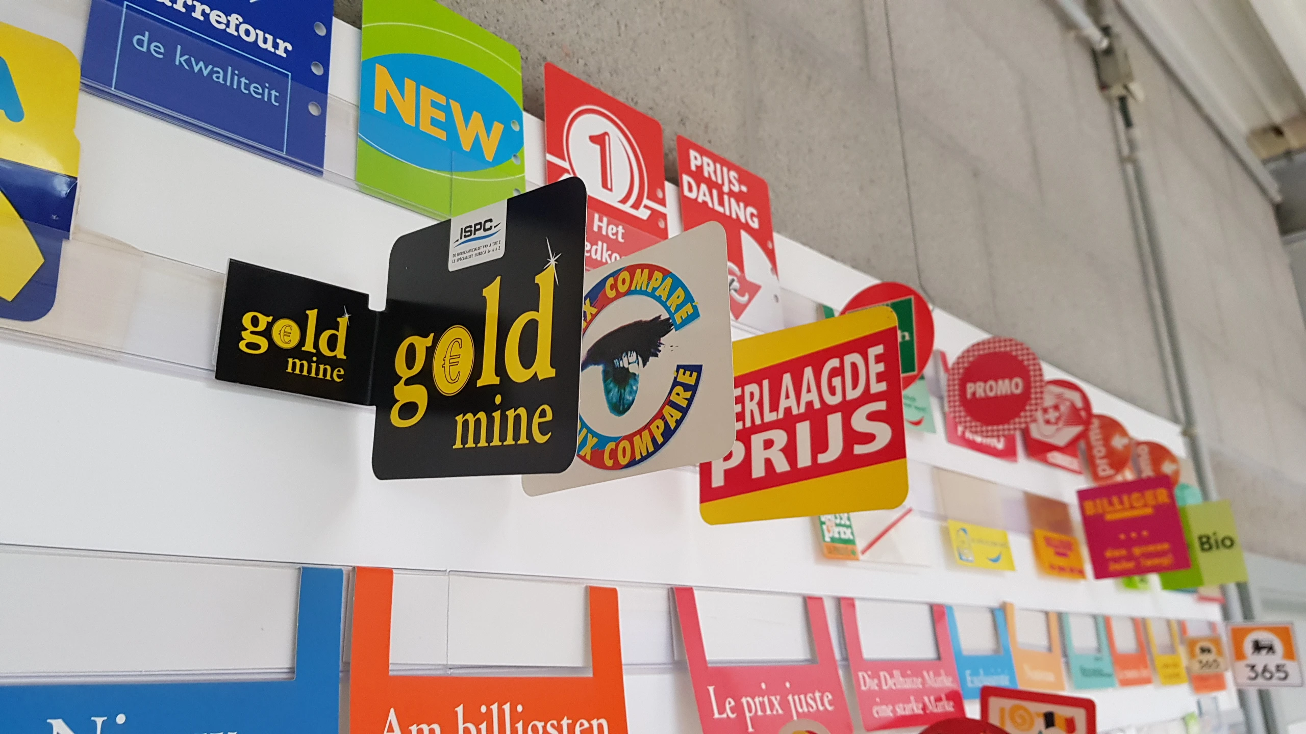 Promotional shelf signs and label holders